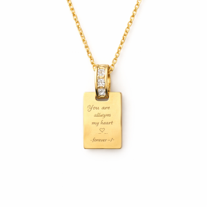 Gold engraved tag necklace with You Are Always in My Heart message on white background