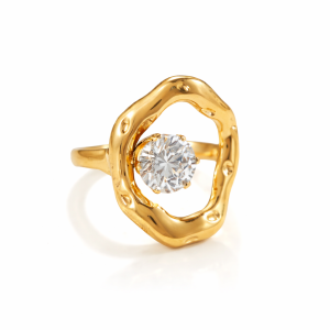 Gold ring with organic open frame design and clear cubic zirconia stone on a white background