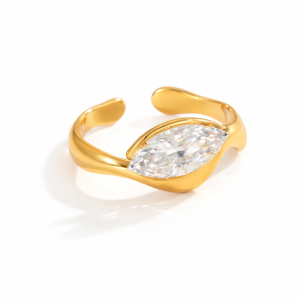 Gold adjustable ring with marquise cut cubic zirconia stone on a white background
