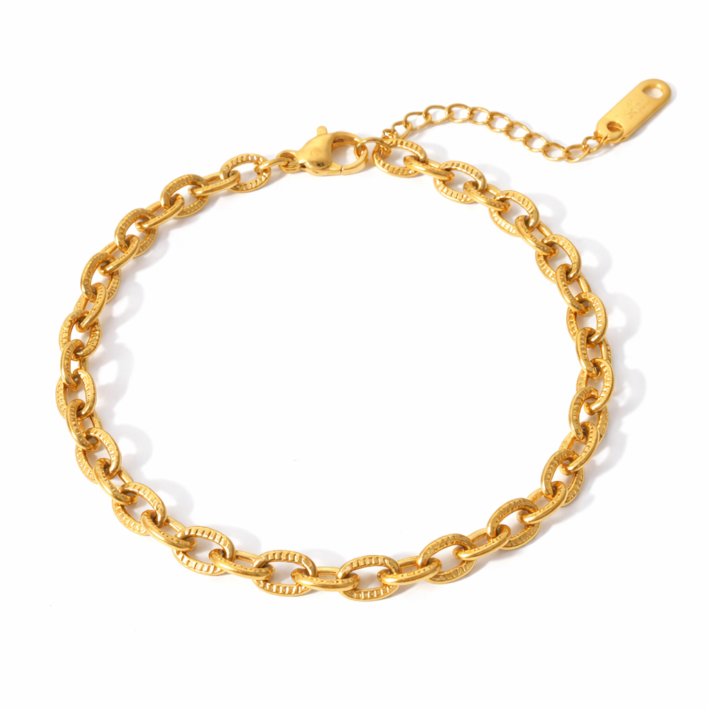 Lucia Link Bracelet in 18K gold-plated stainless steel with textured oval chain links on white background